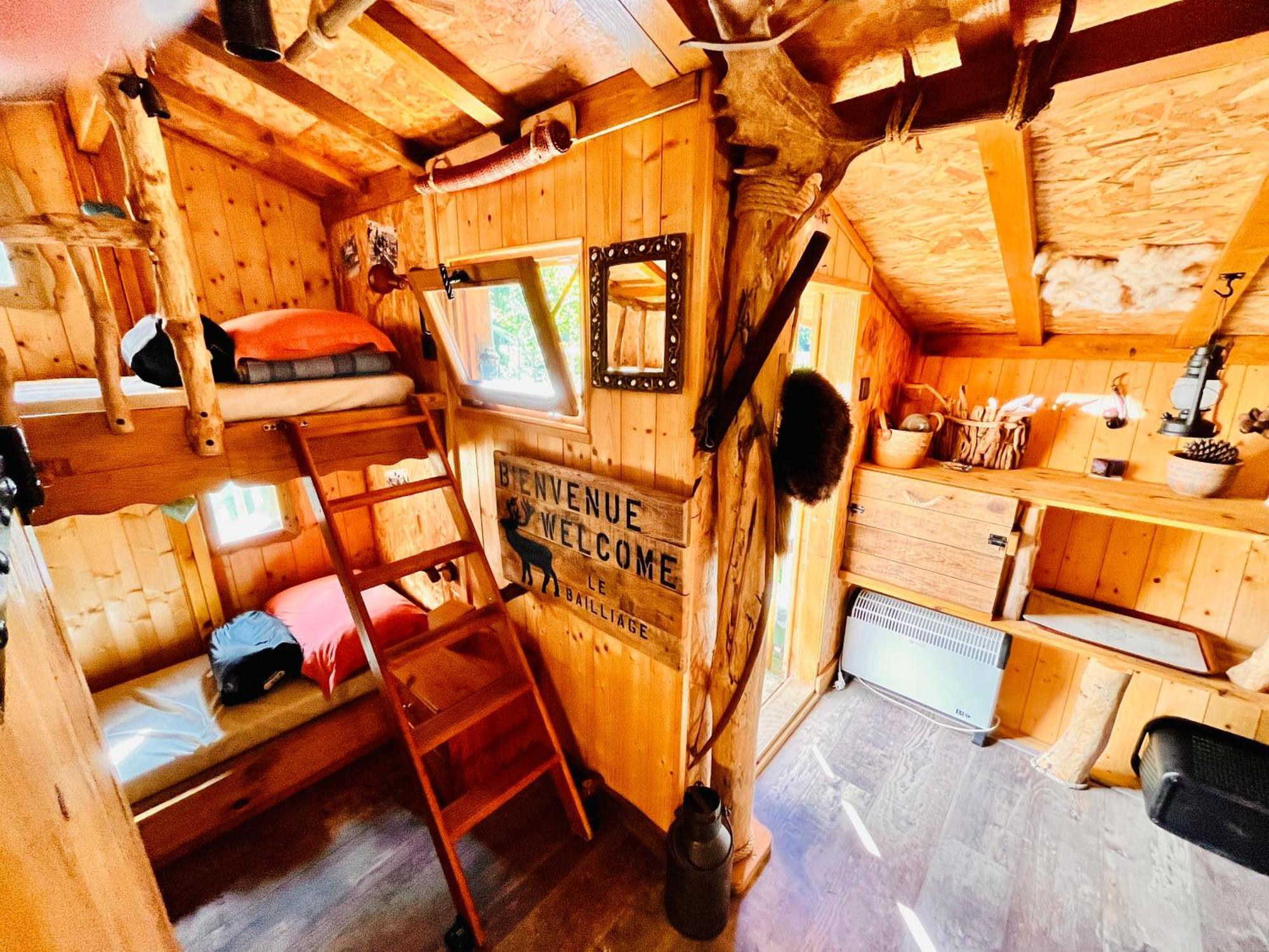 La Cabane Perchee Du Trappeur Écrainville Dış mekan fotoğraf