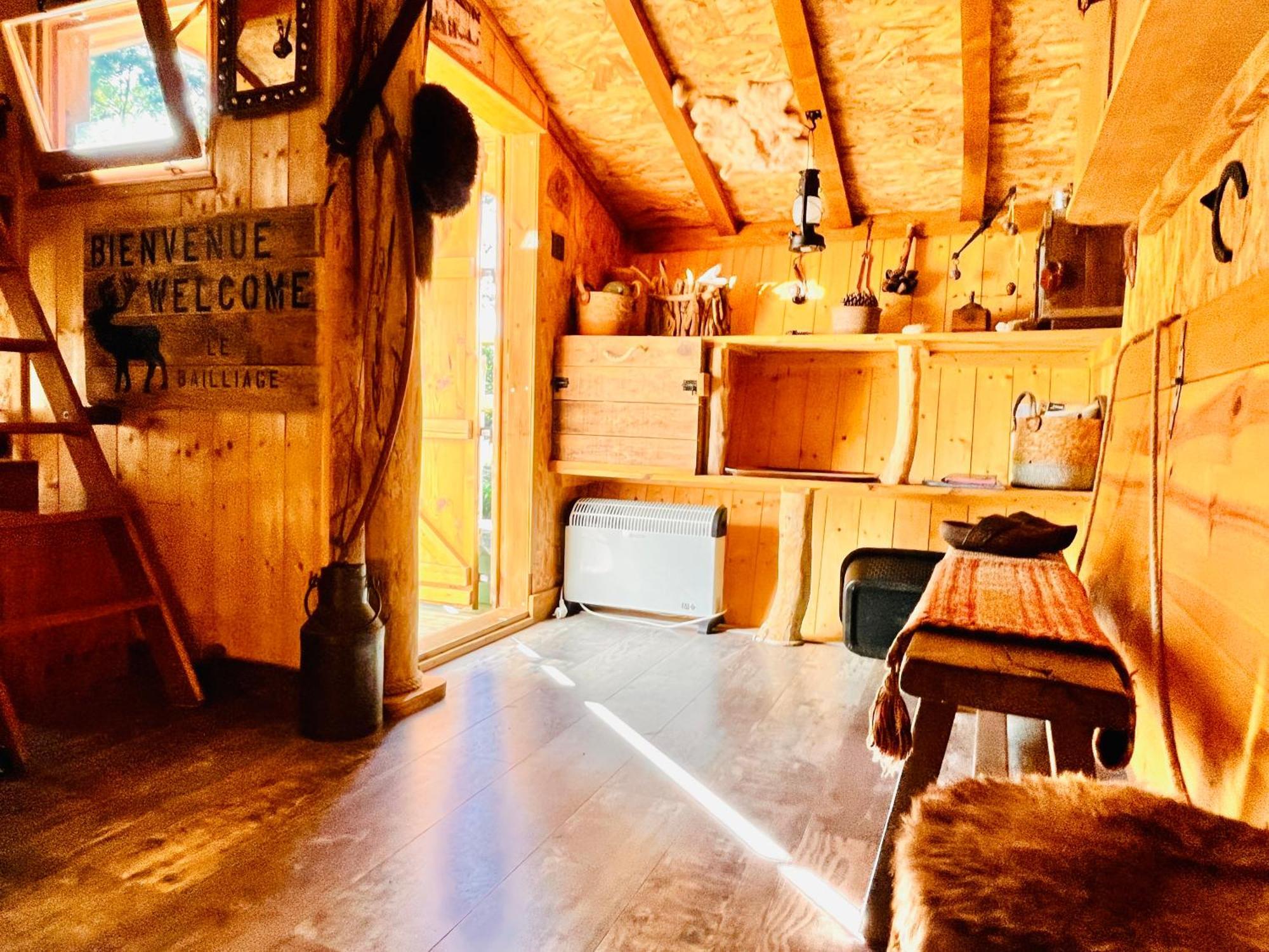 La Cabane Perchee Du Trappeur Écrainville Dış mekan fotoğraf